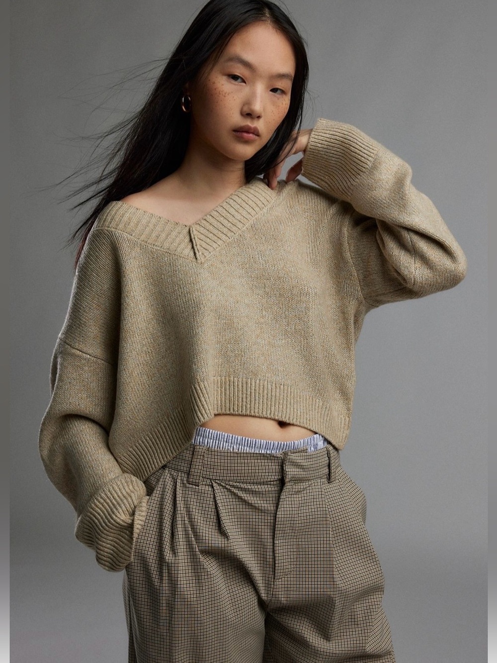 Urban Outfitters.  Tan pullover sweater